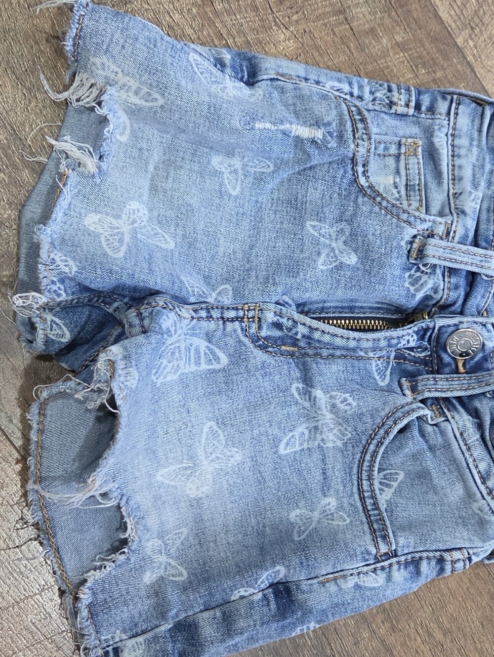 Justice Light Blue Denim Ankle Shorts with White Butterfly Print